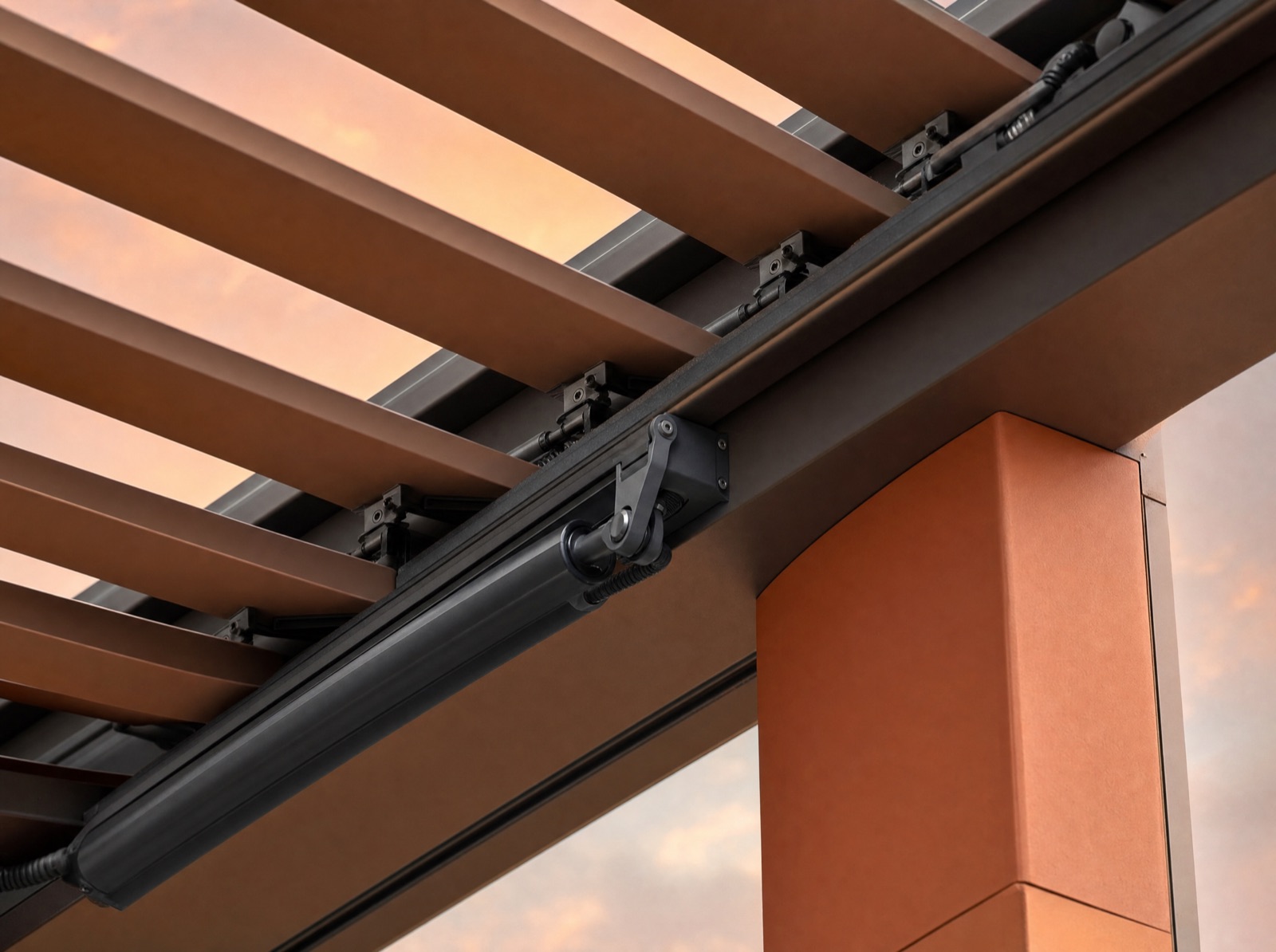 Close-up of an adjustable-louver pergola roof mechanism with warm light filtering through the open blades